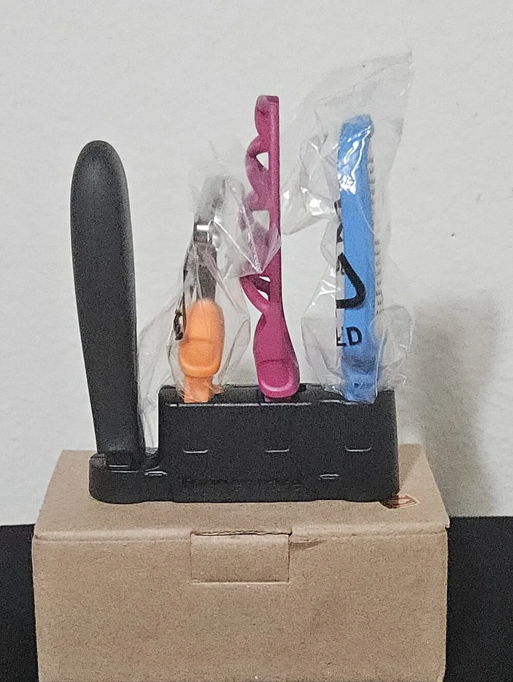 Tupperware 4-Piece Kitchen Tool Set with Black Base and Colorful Handles